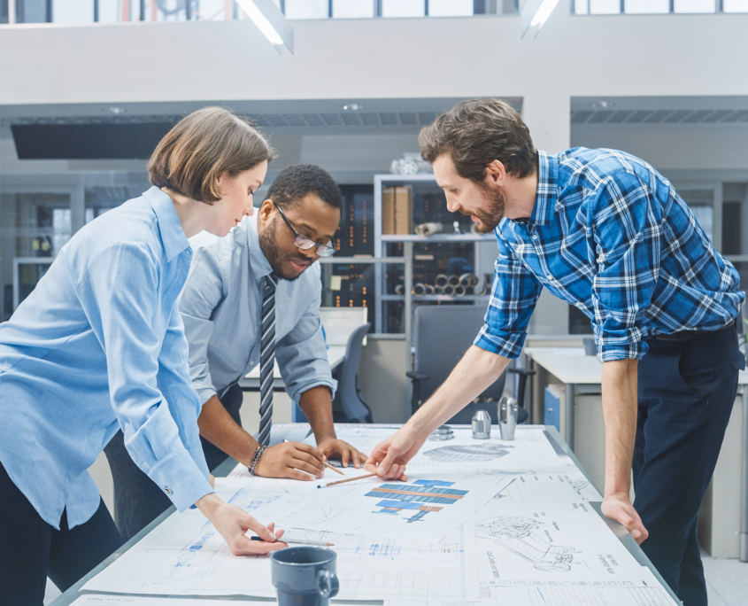 Architects Looking At Plans On Table