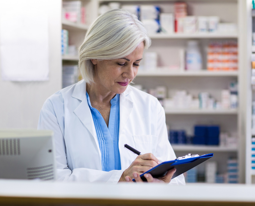 Pharmacist With Clipboard Writing
